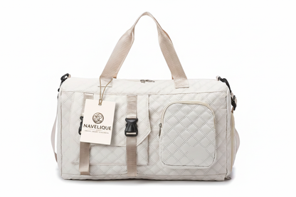 Navelique Hang Tag on Cream Duffle Bag